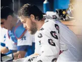  ?? GINA FERAZZI/LOS ANGELES TIMES ?? Dodgers ace Clayton Kershaw ranks third on the defending World Series champs’ payroll but he starts this postseason on the injured list.