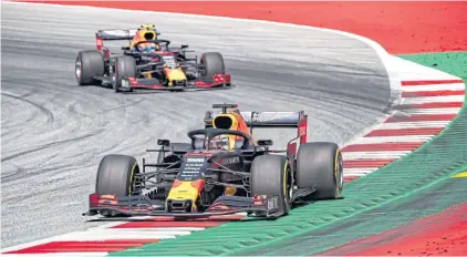  ?? AFP ?? Red Bull’s Max Verstappen, front, on his way to winning the 2019 Austrian Grand Prix in Spielberg.