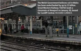 ?? RICHARD CLINNICK. ?? The Welsh Government believes rail in Wales has been underfunde­d by up to £5 billion. Great Western Railway 158765 leads a classmate at Newport on January 30, bound for Cardiff Central.