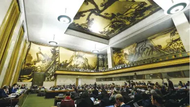  ?? (Denis Balibouse/Reuters) ?? YUN BYUNG-SE (left), South Korea’s foreign minister, addresses the Conference on Disarmamen­t at the United Nations in Geneva yesterday.