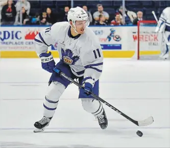  ?? GREGORY VASIL GETTY IMAGES ?? Andreas Johnsson of the Toronto Marlies brings the puck up ice during a game against the Bridgeport Sound Tigers at the Webster Bank Arena on Jan. 21 in Bridgeport, Connecticu­t.