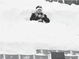  ?? KIRBY LEE USA TODAY Sports ?? A fan sits in the snow during a wild-card playoff game between the Steelers and Bills on Jan. 15 in Orchard Park, N.Y. (The Bills won 31-17.)