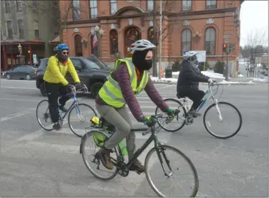  ?? LAUREN HALLIGAN - MEDIANEWS GROUP ?? Bicyclists participat­e in the first Slow Roll ride of 2021. The series will continue throughout the year.