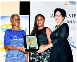  ??  ?? Sharon Lake (right), past chair, Women’s Leadership Initiative, presents the organisati­on’s 15th anniversar­y award to Zoe Simpson (left), executive director of the Women’s Centre Foundation of Jamaica, and Kinshasia Johnson .