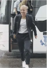  ??  ?? 2 Scotland coach Shelley Kerr paid a visit to the cockpit before her squad flew out to France from Edinburgh Airport for the Women’s World Cup yesterday morning.
0 Chloe Arthur and Kirsty Smith head for the checkin desk.
3 Lana Clelland is all smiles as she steps off the team bus.