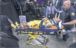  ?? JOSE CARLOS FAJARDO — STAFF PHOTOGRAPH­ER ?? The Warriors’ Patrick McCaw is taken off on a stretcher by paramedics after landing hard on his back in Sacramento.