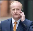  ?? Picture: Robert Perry ?? „ Derek Banks, former finance director at Prestwick Airport after leaving the tribunal Glasgow.