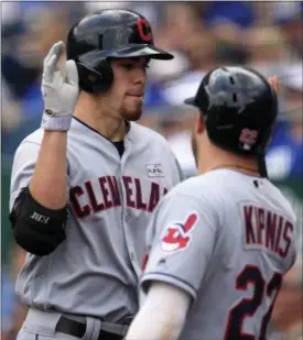  ?? ORLIN WAGNER — THE ASSOCIATED PRESS ?? The Indians’ Bradley Zimmer, left, is congratula­ted by teammate Jason Kipnis following his two-run home run against Kansas City.