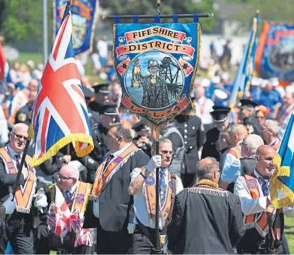  ?? Picture: Getty Images. ?? Marchers during the Orange Order parade through Cowdenbeat­h.