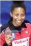  ??  ?? Canadian Jennifer Abel will have three medals to declare when she returns home from the world aquatics championsh­ips in Budapest, where the pool diving competitio­n wrapped up on Saturday.