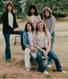  ?? ?? White, seated in blue jeans, with Yes in 1974. Photograph: Michael Putland/Getty Images