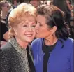  ?? CHRIS PIZZELLO, AP ?? Dec. Debbie Reynolds and daughter Carrie Fisher die.