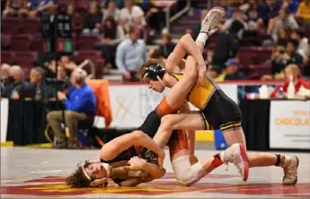  ?? Marc Billett/Tri-State Sports & News Service ?? Bentworth sophomore Chris Vargo, right, advanced to the PIAA Class 2A semifinals at 120 pounds before dropping a 7-5 decision to Jersey Shore sophomore Brock Weiss.