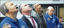  ?? JOEL KOWSKY / NASA ?? NASA astronaut Eric Boe (left) and Norm Knight, deputy director of flight operations at NASA’s Johnson Space Center, watch Saturday’s launch.
