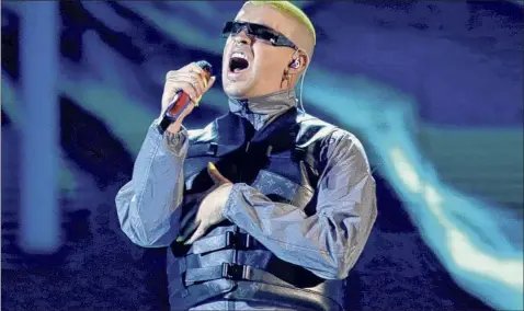  ?? Eric Jamison / AP ?? Bad Bunny performs at the Billboard Latin Music Awards in Las Vegas on April 25, 2019. Bad Bunny received nine nomination­s at the 2020 Latin Grammys, which will air live on Nov. 19 on Univision.