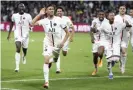 ?? Jean Catuffe/LiveMedia/REX/Shuttersto­ck ?? Achraf Hakimi celebrates after scoring PSG’s late winner against Metz. Photograph: