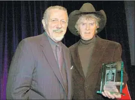  ?? Al Pereira WireImage ?? RAISING POP RADIO TO AN ART FORM Dan Ingram, left, was a Mad magazine of the airwaves, making fun of everything, including hit records. His work inspired Don Imus, right, and other ironists.