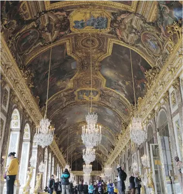  ?? — THE ASSOCIATED PRESS ?? The Hall of Mirrors in the Versailles castle west of Paris. Rick Steves’ summer travel tips include getting tickets in advance for major attraction­s so you can skip the line and avoid the crowds waiting to buy their admission passes.