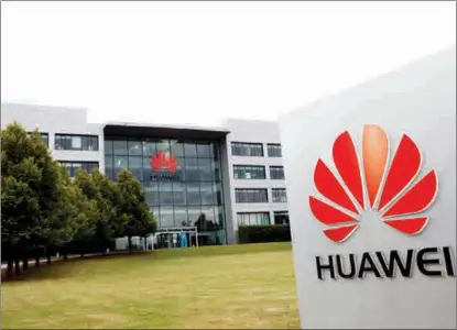  ?? AGENCIES ?? Huawei headquarte­rs building is pictured in Reading, Britain, on July 14. The decision to ban Huawei’s equipment will lead to a huge economic loss for the UK.