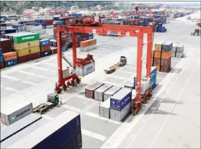  ?? HENG CHIVOAN ?? An overview shot of stacked containers at the Sihanoukvi­lle Autonomous Port in Preah Sihanouk province.