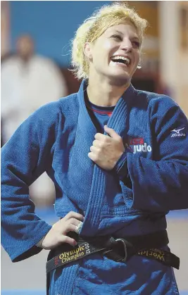  ?? STAFF PHOTOS BY CHRISTOPHE­R EVANS ?? FIRED UP: Olympic judo gold medalist Kayla Harrison, above, and below with national team coach Jimmy Pedro at Pedro’s Judo Center in Wakefield, is training for next week’s Summer Olympics.