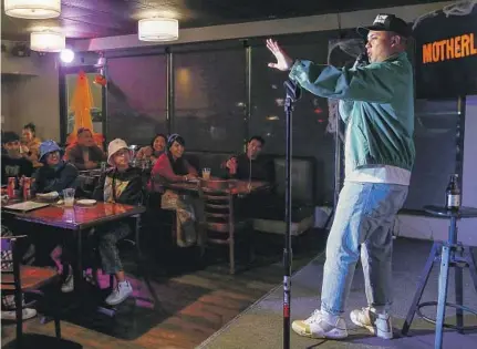  ?? C.J. TOLEDANO, Photograph­s by Luis Sinco Los Angeles Times ?? founder of “Motherland” comedy nights at Kusina Filipina in Eagle Rock, opens a Wednesday night show.