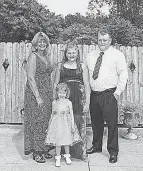  ?? FAMILY PHOTO ?? Julie Wallace, Lewis Dunlap and their daughters, Mallory and Camille.