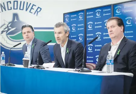  ?? DARRYL DYCK, THE CANADIAN PRESS ?? Canucks brass, from left, head coach Travis Green, president of hockey operations Trevor Linden and general manager Jim Benning spoke to the media Monday, expressing their confidence for next season.