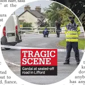  ??  ?? TRAGIC SCENE Gardai at sealed-off road in Lifford