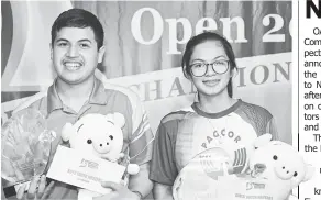  ??  ?? FIL-AUSTRALIAN Jordan Dinham and Dale Lazo hold their trophies proudly after topping the youth boys and girls masters, respective­ly, in the Philippine Internatio­nal Open-Tenpin Bowling Championsh­ips 2019.