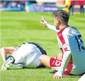  ??  ?? Harry Forrester was lucky to stay on the field after a couple of late challenges, and was eventually substitute­d.