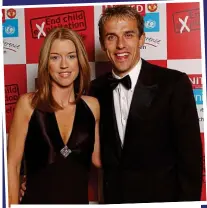  ?? PA ?? Supportive: Phil Neville with his wife Julie at a charity event in Manchester
