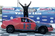  ?? MORGAN AMBER PHOTOGRAPH­Y/SPECIAL TO THE EXAMINER ?? For the second time in less than a week, Griffin Powell (#13) collected a main event checkered flag in the Battlefiel­d Equipment Rental 4Fun division at Peterborou­gh Speedway on Saturday.