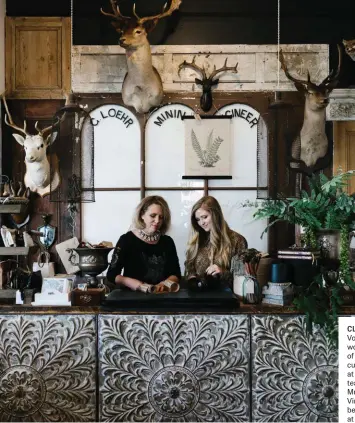  ??  ?? CLOCKWISE, FROM LEFT Vonda and Estella Mason working at the counter of their store; the carefully curated fashion offering at Mr Wolf; candles, teas and homewares at Mr Wolf. FACING PAGE Vintage furniture and beautiful homewares at Paint Me White.