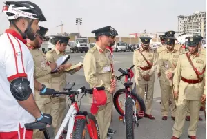  ??  ?? Dubai Police officials during the launch of the first-of-its-kind cycle patrols on Wednesday. These patrols will cover the coastal areas along the Jumeirah Beach and the Dubai Water Canal.