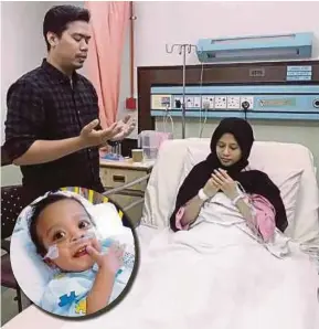  ?? [Foto Mohd Idzzuan Shaarani/bh] ?? Ibu bapa kepada Idzyraf Alsheeraz (gambar kecil) Mohd Idzzuan dan Amirah Izzati Hamidi selepas selamat menjalani pembedahan pemindahan hati di PPUM , Rabu lalu.