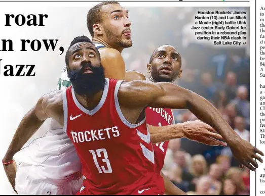  ??  ?? Houston Rockets’ James Harden (13) and Luc Mbah a Moute (right) battle Utah Jazz center Rudy Gobert for position in a rebound play during their NBA clash in Salt Lake City.