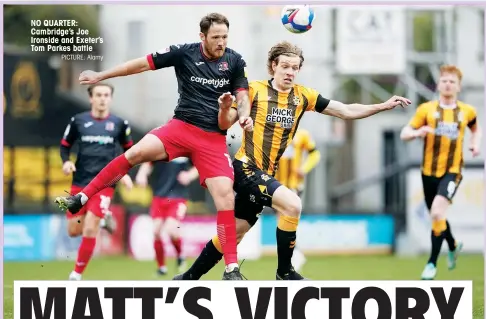  ?? PICTURE: Alamy ?? NO QUARTER: Cambridge’s Joe Ironside and Exeter’s Tom Parkes battle