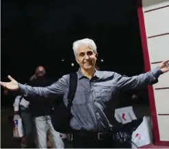  ??  ?? ISTANBUL: Turkish cartoonist Musa Kart of the Cumhuriyet newspaper gestures after being freed from Silivri prison on July 28, 2017 following a Turkish court order to free the seven defendants in the trial of the Cumhuriyet newspaper staff. —AFP