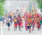  ??  ?? (From left) Snapshots of kanwarias on a journey of faith in Muzaffarna­gar and Allahabad on Saturday.