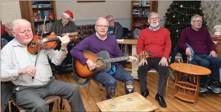  ??  ?? Christmas party with music from the O’Shea brothers Tralee, for patients and staff at St Louis Nursing Home, Tralee, on Wednesday night, from left Timmy, Michael, Frankie and John O’Shea, Tralee. Photo: John Cleary.