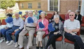  ?? Photo courtesy of Parkway Place ?? Parkway Place residents gather for the homecoming parade.