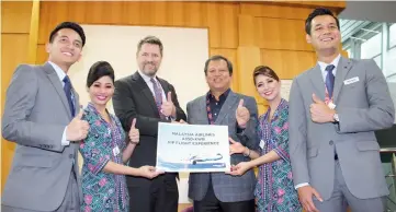  ??  ?? Arved (third left) with Sabah Tourism Board chairman Datuk Joniston Bangkuai at the launch of Malaysia Airlines Berhad’s A350 aircraft.