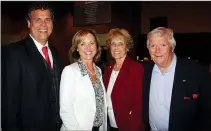  ??  ?? Craig and Laura Underwood, from left, and Le Ann and Bill Underwood enjoy the Yvonne Richardson Center fundraiser Tuesday evening.