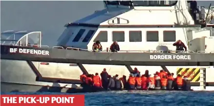  ?? ?? THE PICK-UP POINT
Ready to go: The Border Force Defender is seen assisting the migrant handover on Sunday morning