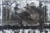  ?? YEVGEN HONCHARENK­O — THE ASSOCIATED PRESS ?? An aerial view of apartment buildings in Kramatorsk, Ukraine, is shown on Thursday after being hit by Russian rockets.