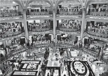  ?? RICK STEVES/RICK STEVES’ EUROPE PHOTOS ?? European department stores, such as Galeries Lafayette in Paris, can be glamorous platforms for top fashion.