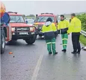  ?? Picture: SUPPLIED ?? TRAGEDY: Emergency responders at the scene where a bakkie carrying 23 people overturned, killing three.