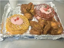  ?? COURTESY ?? Good Azz Eats, offering “comfort cuisine for the heart and soul,” opened April 9 at 492 E. Main St. in Pen Argyl. Pictured are waffles with honey looger fried chicken wings.