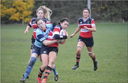  ??  ?? Leah Coffey is hanging on for dear life until help arrives during Wicklow’s great win over Barnhall on Sunday.